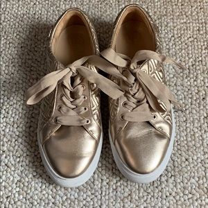 Gold Tory Burch sneakers